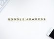 Google Adwords spelled out in scrabble tiles