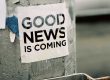 The words Good News is Coming on flyer